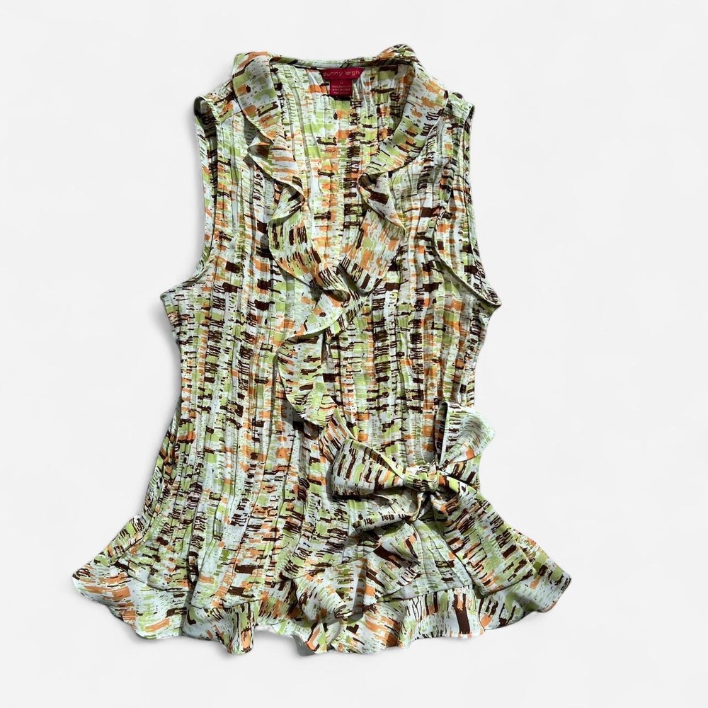 Lightweight flowy blouse in a soft green, orange, and brown abstract print